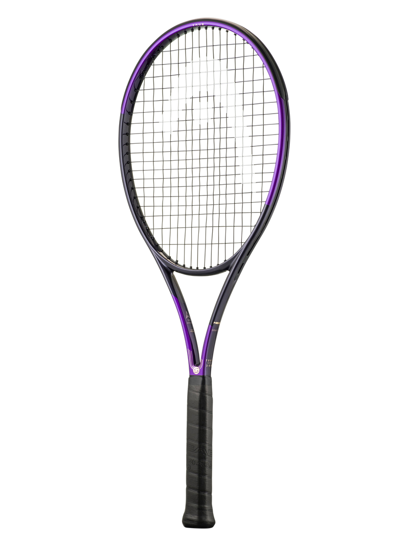 A tennis racket with a black frame and purple trim, featuring black strings and a black grip, shown against a plain white background.